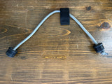 Gray Bungee with black connectors and a pull strap