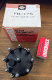 Standard automotive parts box and distributor cap on a wooden surface