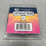 Packaged wire on a gray surface with a visible brand label.